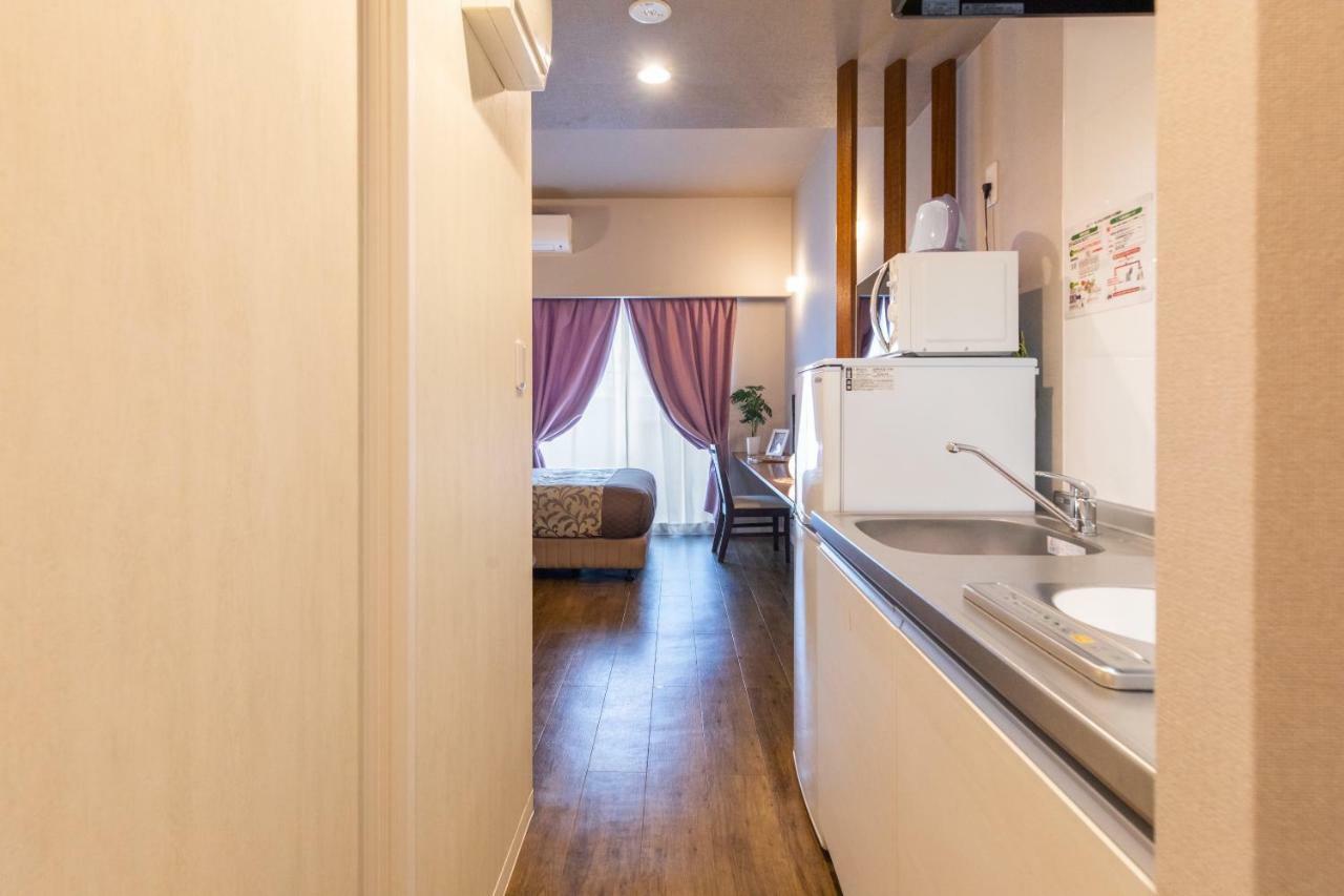 Aparthotel Mr. Kinjo In Ishikawa Inter Uruma